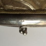 Sterling silver and leather designer handbag
