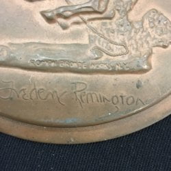 Frederic Sackrider Remington [1861-1909] : <i>Brass Native medallion</i>, ca.1950.