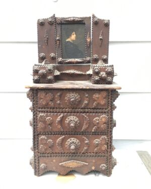 [unattributed] American tramp art : <i>Tramp art miniature chest of drawers with oil painting portrait</i>, ca.1890s.